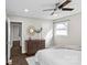 Bright bedroom with hardwood floors and ceiling fan at 1814 Archdale Dr, Charlotte, NC 28210