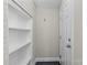 Small entryway with built-in shelving at 1814 Archdale Dr, Charlotte, NC 28210