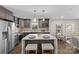 Modern kitchen with stainless steel appliances and an island at 1814 Archdale Dr, Charlotte, NC 28210