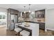 Modern kitchen boasts stainless steel appliances and an island at 1814 Archdale Dr, Charlotte, NC 28210