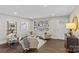 Living room with hardwood floors, neutral decor, and natural light at 1814 Archdale Dr, Charlotte, NC 28210