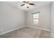 Bedroom with carpeted floor and ceiling fan at 1907 Catkin Ln, Charlotte, NC 28205