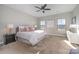 Spacious bedroom with carpeted floor and ceiling fan at 1907 Catkin Ln, Charlotte, NC 28205