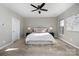 Bright bedroom with carpeted floor and ceiling fan at 1907 Catkin Ln, Charlotte, NC 28205