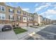 Row of townhouses showcasing architectural details and landscaping at 1907 Catkin Ln, Charlotte, NC 28205