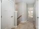 Upstairs hallway with carpet and neutral paint at 1907 Catkin Ln, Charlotte, NC 28205