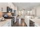 Open kitchen boasting stainless steel appliances and a large island at 1907 Catkin Ln, Charlotte, NC 28205