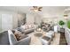 Spacious living area featuring comfortable seating and a view of the kitchen at 1907 Catkin Ln, Charlotte, NC 28205