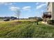 View of community green space with road access at 1907 Catkin Ln, Charlotte, NC 28205