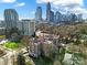 Apartment building with a city skyline view in the background at 301 W 10Th St # 205, Charlotte, NC 28202