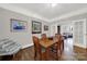 Dining area with hardwood floors, a table, and chairs at 301 W 10Th St # 205, Charlotte, NC 28202