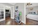 Hallway with built-in shelving, leading to living room and bedroom at 301 W 10Th St # 205, Charlotte, NC 28202