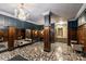 Spacious lobby with crystal chandelier and rich wood paneling at 301 W 10Th St # 205, Charlotte, NC 28202