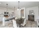 Modern white kitchen with stainless steel appliances and an island at 3020 Sadler Woods Ln, Charlotte, NC 28214