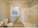 Small bathroom with shower/tub combo at 315 W Clairmont St, Troy, NC 27371