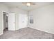 Bright bedroom with double door closet and plush carpeting at 3323 Glenn Hope Way, Matthews, NC 28104