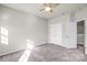 Spacious bedroom with double doors and carpet flooring at 3323 Glenn Hope Way, Matthews, NC 28104