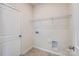 Laundry room with wire shelving and space for a washer and dryer at 4540 Dusty Orchard Rd, Kannapolis, NC 28081