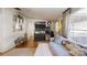 Living room with ample natural light and access to a covered porch at 5120 Gates Dr, Denver, NC 28037