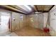 Additional workshop space with wood flooring and storage at 5120 Gates Dr, Denver, NC 28037