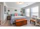 Bright bedroom with a comfortable bed and ample natural light at 5158 Turtle Creek Dr, Denver, NC 28037