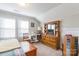 Bedroom with wooden dresser and window seating at 5158 Turtle Creek Dr, Denver, NC 28037