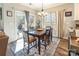 Bright dining room with table and chairs, near sliding glass doors at 5158 Turtle Creek Dr, Denver, NC 28037