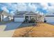 Gray craftsman style home with stone accents and a covered porch at 5158 Turtle Creek Dr, Denver, NC 28037