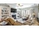 Cozy living room with built-in shelving and fireplace at 5158 Turtle Creek Dr, Denver, NC 28037