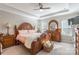 Main bedroom with a king-size bed and wooden furniture at 5158 Turtle Creek Dr, Denver, NC 28037