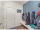 Convenient mudroom with built-in bench and coat hooks at 612 Spencer Ln, Kannapolis, NC 28081