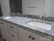 Double vanity bathroom with granite countertop and modern sinks at 6524 Athens Ln, York, SC 29745