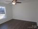 Spacious bedroom featuring wood-look floors and a large window at 6524 Athens Ln, York, SC 29745