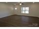 Spacious living room featuring hardwood floors and ceiling fan at 6524 Athens Ln, York, SC 29745