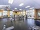 Well-equipped gym featuring modern exercise machines and weights for a complete fitness experience at 6605 Central Pacific Ave, Charlotte, NC 28210