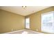 Bright bedroom with neutral walls and carpet flooring at 7757 St Andrews Ln, Stanley, NC 28164