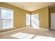 Bedroom with carpet flooring, neutral walls and double doors at 7757 St Andrews Ln, Stanley, NC 28164