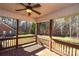 Wooden deck overlooking backyard with wooded views at 7757 St Andrews Ln, Stanley, NC 28164