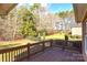 Deck with backyard and wooded area views at 7757 St Andrews Ln, Stanley, NC 28164