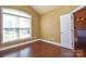 Home office with hardwood floors and large window at 7757 St Andrews Ln, Stanley, NC 28164