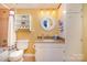 Bathroom with granite vanity top and hexagon tile floor at 8149 Mattingridge Dr, Charlotte, NC 28270