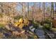 Wooden deck with yellow Adirondack chairs at 8149 Mattingridge Dr, Charlotte, NC 28270