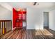 Wet bar with red cabinets and shelving, located in open space at 8149 Mattingridge Dr, Charlotte, NC 28270