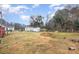 Spacious yard with various outbuildings, offering plenty of room for outdoor enjoyment at 939 Malotte Ln, Gastonia, NC 28054