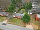 Aerial view showcasing a brick home's neighborhood setting at 951 Cedar St, Rock Hill, SC 29730