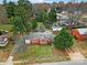 Aerial view of a charming brick house and surrounding area at 951 Cedar St, Rock Hill, SC 29730