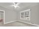 Bright bedroom with neutral walls and carpet at 951 Cedar St, Rock Hill, SC 29730