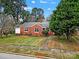 Brick ranch house with a large front yard at 951 Cedar St, Rock Hill, SC 29730