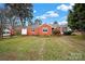 Brick ranch house with a well-maintained lawn at 951 Cedar St, Rock Hill, SC 29730