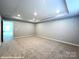 Spacious carpeted bedroom with recessed lighting, offering a blank canvas at 9831 Quercus Ln, Huntersville, NC 28078